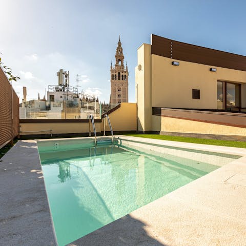 Enjoy a dip with a view in the shared pool or relax on the communal terrace