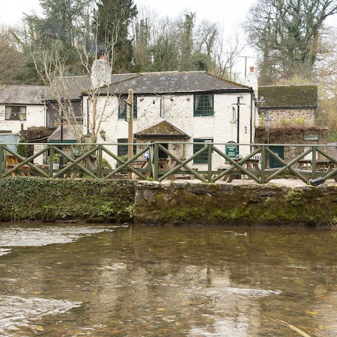 Walk to the nearby historic inn on the river