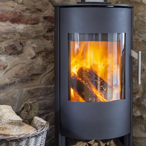 Keep toasty even in the winter months thanks to the contemporary log burner