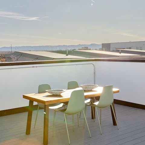Take your breakfast up to the communal rooftop terrace and watch the sun rise over the city