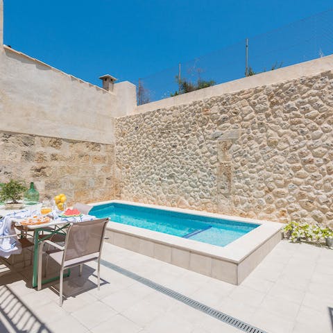 Cool off from the Mallorcan sun in your private pool