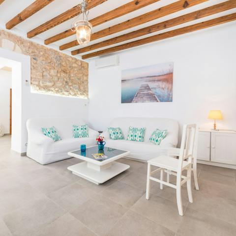 Plan you day in Mallorca from the comfy, white sofa