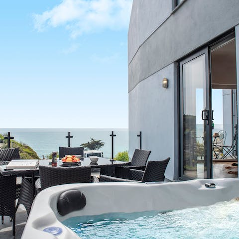 Relax in the private hot tub or eat alfresco in the seaview terrace
