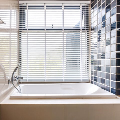 Take long, relaxing baths in the deep tub, sipping a glass of wine and looking out the window