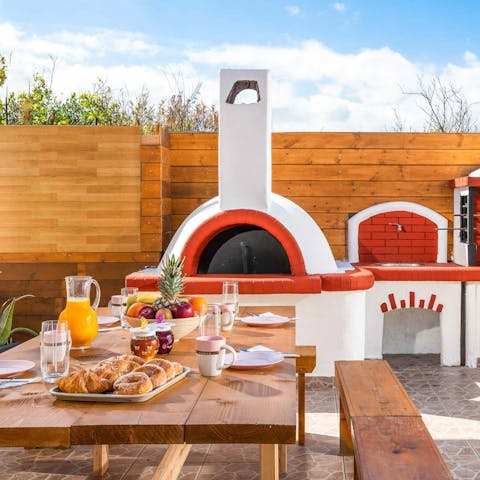 Cook your favourite Greek dishes in the outdoor kitchen 