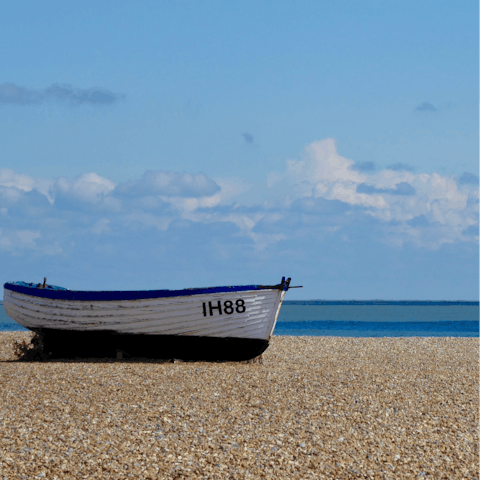 Drive fifteen minutes to Aldeburgh for fish and chips on the beach