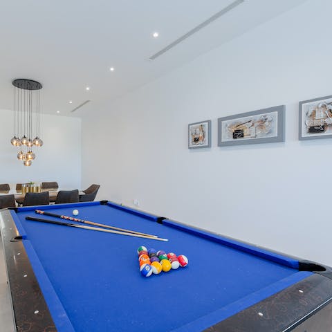 Embark on a pool tournament in the games room