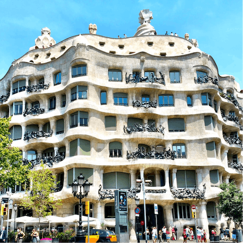 Take a sixteen-minute stroll down to Casa Milà, then head up to the rooftop