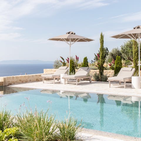 Soak up the Greek sun from in or beside the communal pool