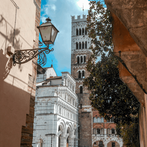 Spend the day wandering beautiful Lucca, only a short drive away