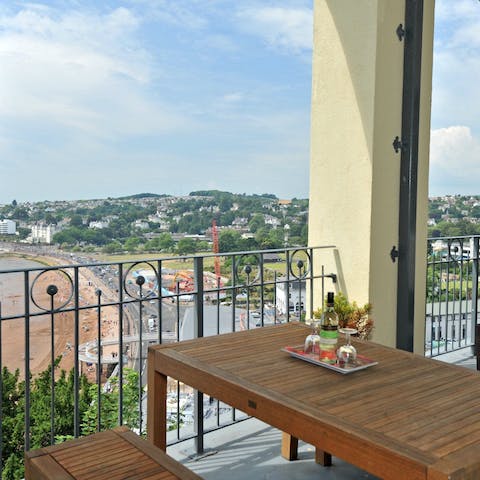 Pop open a bottle of wine to share on the balcony at sunset