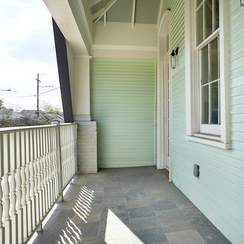 Watch the world go by from your own quaint little porch