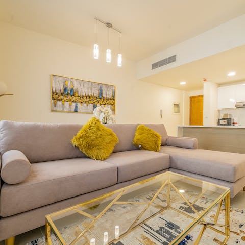 Stretch out in the living area after a day of sight-seeing in Dubai