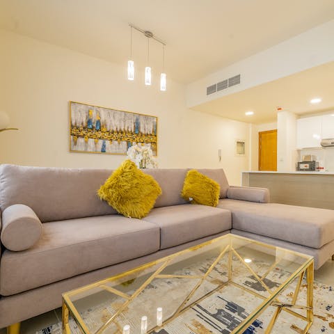 Stretch out in the living area after a day of sight-seeing in Dubai 