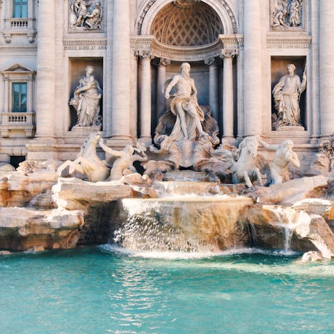 Make a wish in the Trevi Fountain, not far on foot