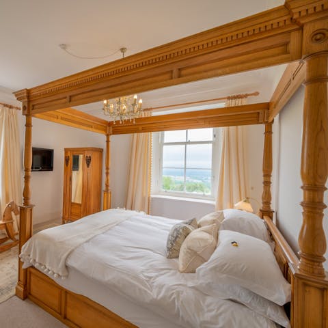 Luxuriate in the master bedroom's four-poster bed