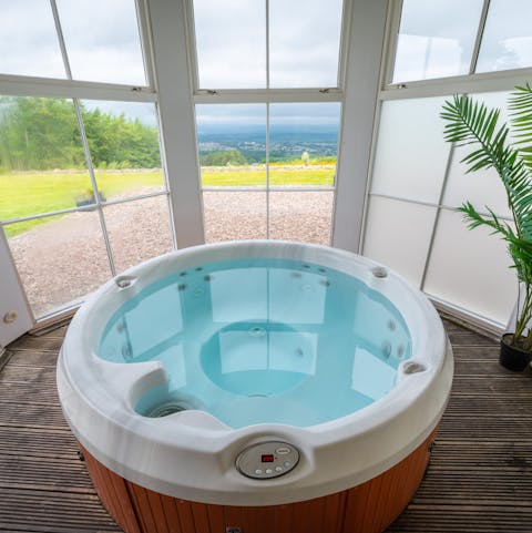 Take in the view from the turret hot tub