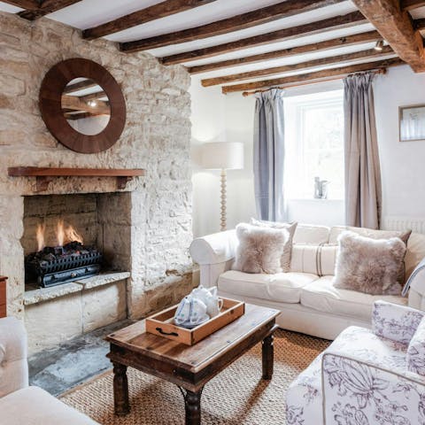 Light the fire and curl up with a book in the sitting room