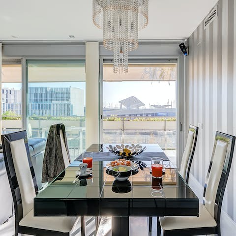Dine in style in the light-filled apartment