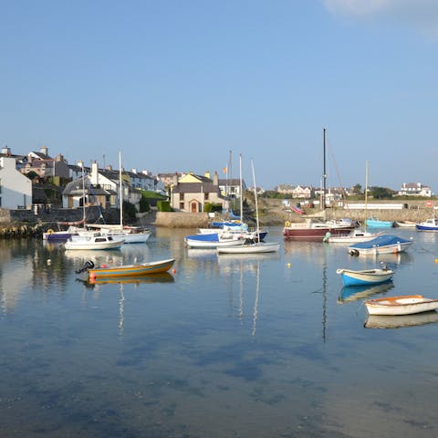 Stay in the charming village of Cemaes Bay, just a short walk from Traeth Mawr beach