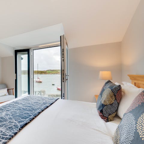 Wake up each morning in the main bedroom to views of the rolling waves and the sound of seagulls
