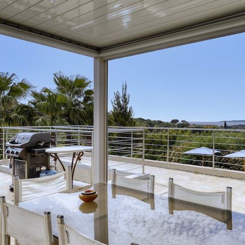 Admire stunning views as you dine alfresco out on the balcony