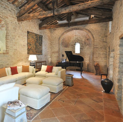Play the grand piano in the converted chapel