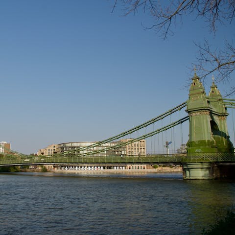 Take a stroll along the Thames towards Hammersmith Bridge, fourteen minutes away on foot