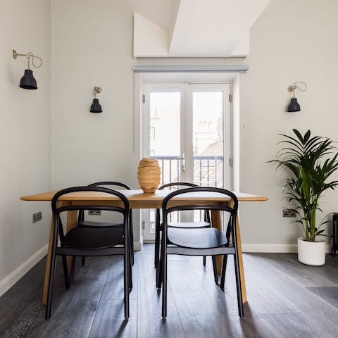 Share meals around the table – on warm days, open the French doors to the Juliet balcony