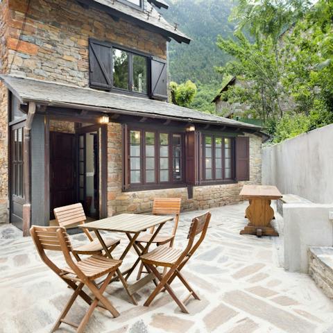 Breathe in cleansing lungfuls of mountain air while seated on the terrace