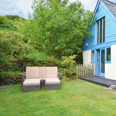 Catch some rays in the warmer months from your loungers in the luscious, vibrant garden