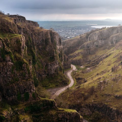 Drive through the spectacular Cheddar Gorge, thirty minutes away by car