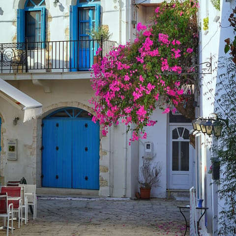 Stroll around the heart of charming Panormos village, a short walk away
