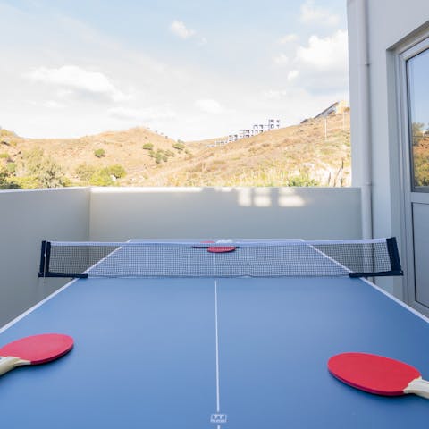Challenge the more competitive members of your group to a game of table tennis