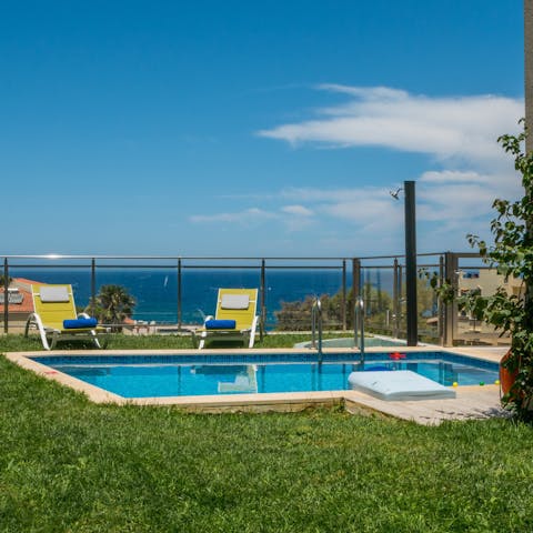 Admire views of the Sea of Crete as you splash around in your private pool
