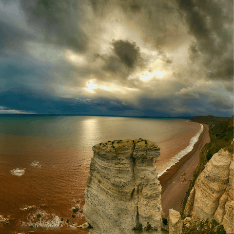 Admire the impressive views across Branscombe Beach from the walking trails along the Hooken Cliffs