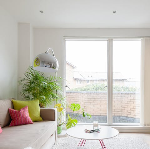 Open the sliding doors onto the terrace  and relax on the comfy sofa