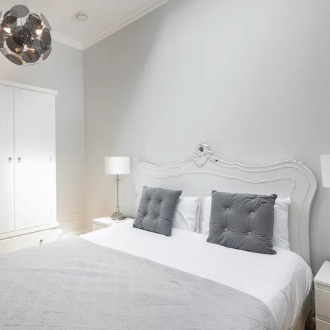 Get some rest in the elegant bedroom after a busy day