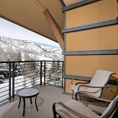 Take in the snowy vista from the private balcony
