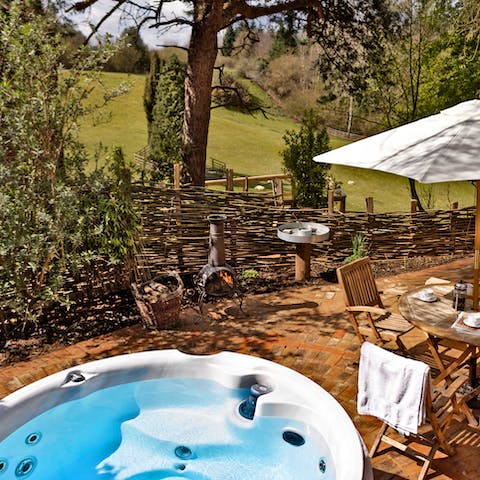 Book a slot in the hot tub and savour the peace of the countryside