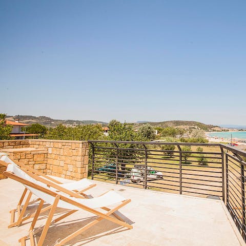Soak up the sun and sea views on the upper terrace