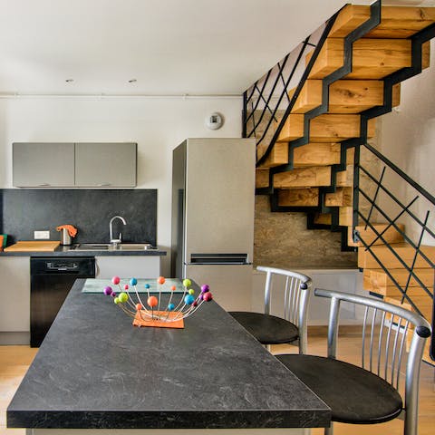 Perch at the kitchen island with a plate of flaky pastries