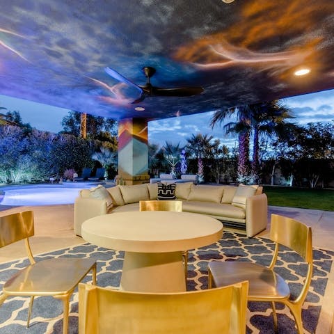 Spend your evenings sipping cocktails, playing games, and sharing stories on the covered terrace