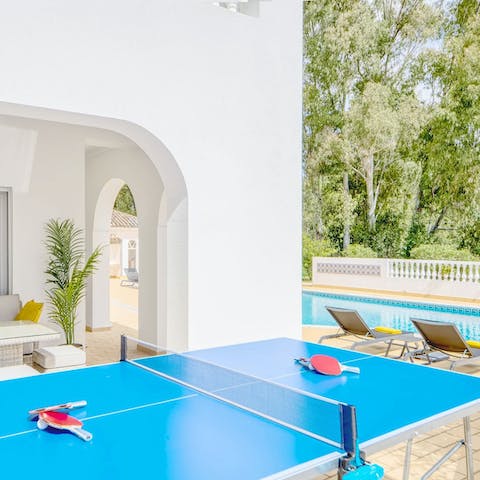 Enjoy a game of table tennis on the terrace with loved ones