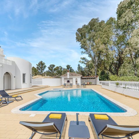 Soak up the Algarve sun from in or beside the private pool
