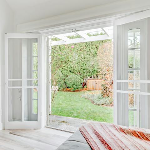 Enjoy the light and fresh air through the French doors