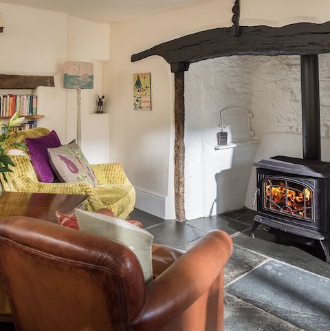Warm your feet by the fire after wild walks along the coast