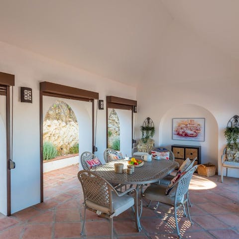 Fire up the barbecue and serve up smoky flavours on the covered terrace
