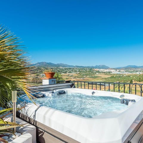 Pop open a bottle and enjoy a nightcap from the comfort of the hot tub
