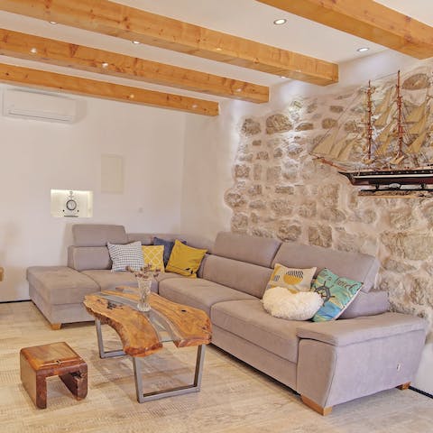 Get cosy in the comfort of the stylish living room